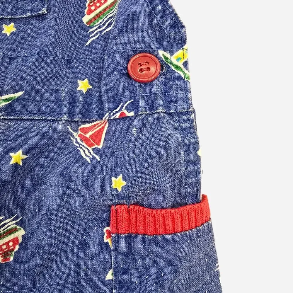 OshKosh B'gosh blue denim overalls with white & red sailboat and star print
